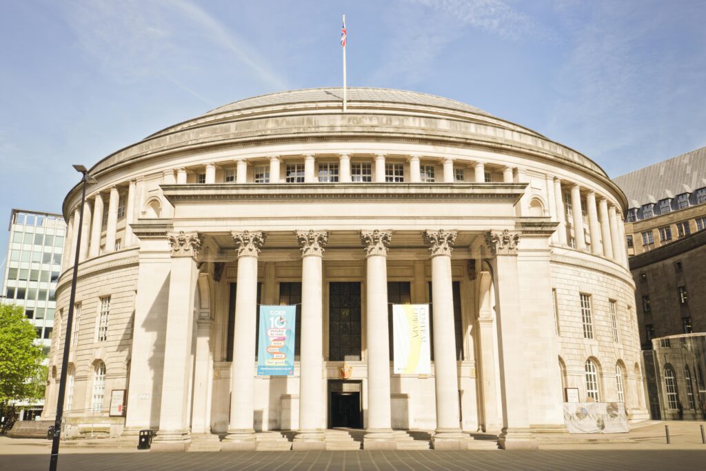 Front view of Manchester Central Library, showcasing its neoclassical architecture.