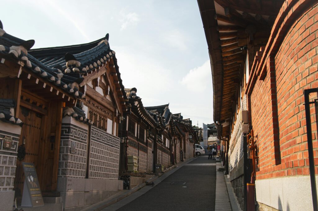 Explore the traditional architecture of Bukchon Hanok Village in Seoul, showcasing historic charm.